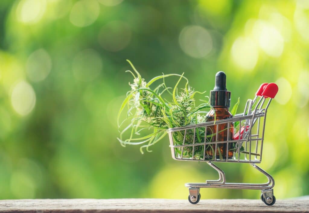 cannabis with cannabidiol (cbd) extract in a shopping cart